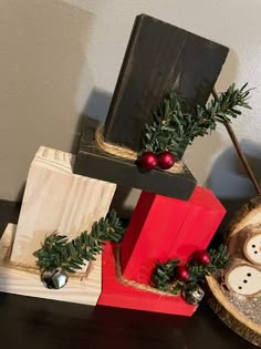 a christmas decoration made out of wood and other items