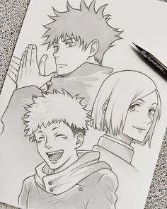 a drawing of two anime characters on paper