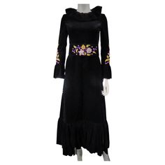 Circa 1990 France Long evening dress in black silk velvet by Jean-Louis Scherrer Haute Couture dating from the 1990s. Pleated collar in bouillonné velvet ruff found on the sleeves and the bottom of the dress which is flared. Psyquedelic embroidery of multicolored flowers in polychrome silk, rhinestones and silver beads on the sleeves and on the wide belt. Closure of the dress at the back by zipper and hook at the collar. Black taffeta lining. Label Jean-Louis Scherrer St. Avenue  Montaigne Paris Jean Louis Scherrer, Gowns Aesthetic, French Couture, Multicolored Flowers, Pleated Collar, Fantasy Wardrobe, Long Evening Dress, Velvet Skirt, Silk Print Dress