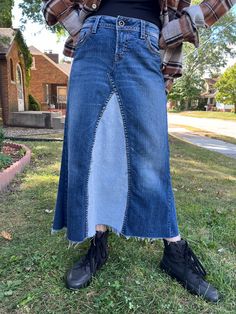 Long upcycled jean skirt. Size approximately 6/8.  Silver jeans 30/33.  see measurements below.  Styled with a two-toned denim design. this skirt was upcycled and re-purposed from several pairs of jeans.  My model is 5'3", weighs 110 lbs. This skirt was too big for her but it still looked nice.    This is the exact skirt you will be receiving.  This skirt is ready to ship. It was handmade by me.  all fabrics and materials are from up cycled and used items.  I use high-quality items, I triple sew for durability.  All raw edges will fray.  this is part of the character of the skirt.  certain patches are sewn with a zigzag stitch for less Fray purposefully.  skirts have been washed to start the fraying process, and Will fray more with washing.  there is a half inch sew line at the hem, it wil Long Jean Skirt, 110 Lbs, Upcycle Jeans, Long Jeans, Jeans Rock, Denim Design, Silver Jeans, Jean Skirt, Denim Skirt