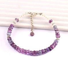 "Extremely Alexandirite Beads Rare Alexandirite Faceted Rondelle Beads Sparkling Color Change Stone Beads Bracelet Product -; Rare Alexandrite Grade-: AAA High Quality Stone shape-: Faceted Beads Shape Color= PINK Green Purple Length-: 7\"Inch Quantity -: 1 Strand Size-: 4 to 5 MM Genuine Measurements and weight are close to approximations We accept bulk or wholesale orders for any gemstone which you'll get best wholesale prices! Hence you can contact me with your requirement of bulk or wholesal Handmade Adjustable Rondelle Pearl Bracelet, Beaded Amethyst Rondelle Jewelry, Spiritual Rondelle Faceted Beaded Bracelets, Handmade Pearl Bracelet With Round Beads For Healing, Amethyst Beaded Bracelets With Spacer Beads As Gift, Spiritual Rondelle Beaded Bracelet With Spacer Beads, Spiritual Rondelle Beaded Bracelets, Spiritual Beaded Rondelle Bracelets, Amethyst Spacer Beads Jewelry