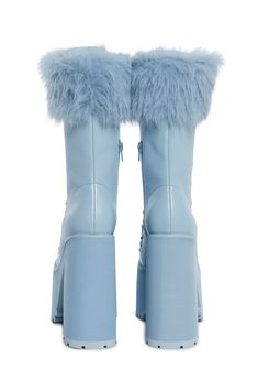 Look cute at the ski lodge with these boots that have a vegan leather construction, a faux fur trim, platform treaded soles, block heels, a front-lace-up design, and side zipper closures. Diy Fur Boots, Vegan Leather Boots, Snow Bunny, Sugar Thrillz, Snow Bunnies, Festival Shop, Ski Lodge, Blue Boots, Fashion Project