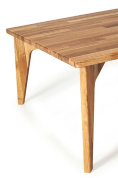 a small wooden table with one leg bent down and the other end turned slightly to the side