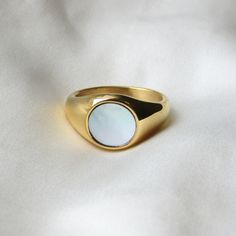 *18k gold plated stainless steel ring *Mother of pearl accents Currently available in 3 sizes! * US size 6 (Pandora 52, UK L - L 1/2) * US size 7 (Pandora 54, UK M 1/2 - N 1/2) * US size 8 (Pandora 57, UK P 1/2 - Q) Modern Gold Pearl Ring For Everyday, Modern Everyday Gold Pearl Ring, Gold Pearl Ring With Metal Band, Gold Plated Pearl Ring Gift, Gold Plated Pearl Ring As A Gift, Gold Plated Pearl Gift Ring, Gold Pearl Ring With Polished Finish For Promise, Classic Gold Plated Round Pearl Ring, Gold Plated Pearl Ring