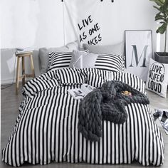 PRICES MAY VARY. 【High Material】: Our this striped comforter is high quality cotton with soft ultra microfiber inner fill. Super soft, hotel quality, durable, breathable, and machine washable. 【3Pcs Black White Striped Comforter Sets Twin】 : 1 x twin striped comforter ( 68" x 90") + 2 x standard pillowcases ( 20" x 26"). 【Striped Design】: Modern black and white striped comforter for boys girls ticking style 3pcs bedding comforter sets. Give you a simple and warm room, and our black and white com Black And White Striped Bedding, Black White Bedding, Black And White Bedding, Teen Bedding Sets, Striped Comforter, Bedding Comforter Sets, Full Bedding, Black Bed Set, Queen Size Comforter Sets