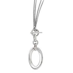 Modern and sophisticated, this fashion necklace offers an instant update. Created in sterling silver, this design features an open oval-shaped drop. The double fancy chain loops around the neck, securing in front with a toggle clasp. A great look anytime, this 17.0-inch necklace is finished with a bright polished shine. Beach Jewelry Diy, Delicate Jewelry Necklace, Geometric Silver Jewellery, Diy Jewelry Necklace, Jewelry Diy Bracelets, Chain Loop, Toggle Necklace, Tiffany Jewelry, Shell Jewelry