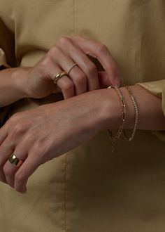 The TWO / ONE Collection features contrasting materials for texture and balance.Featuring baguette diamonds set in 14k yellow gold.Complete the look with our Familia Cuban Bracelet. Links are semi hollow for a light and comfortable fit.Lobster clasp closure, with extension. 14k solid gold—always Weight: 7g Total width: 2.7mm Length: 6.5-7", Adjustable Height: 2.5mm Diamond size: 1.5x2.4mm Carat weight per diamond: ctw Total carat weight: Approx 0.75ctw Diamond shape: Baguette Diamond clarity: VS Luxury Tennis Bracelet With Diamond Accents For Everyday, Luxury Tarnish-resistant Tennis Bracelet For Everyday, 14k Gold Diamond Bracelet With Rectangular Links, Everyday Luxury Yellow Gold Diamond Bracelet With Rectangular Links, Timeless Diamond Bracelet With Solid Link Construction For Everyday, Timeless Diamond Bracelet With Solid Link Construction, Timeless Everyday Diamond Bracelet With Solid Links, Fine Jewelry Gold Bracelet With Rectangular Links, Everyday 14k Gold Baguette Diamond Jewelry