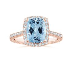 a cushion cut blue topaz ring with diamonds