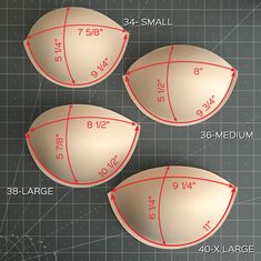 three eggs sitting on top of a table next to a measuring scale with measurements for each egg