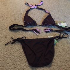 Brand New With Tags Becca Brown And Purple Ruffle Crochet Like Top Size Medium, And String Bikini Bottom Size Small In Brown. Adjustable Tie Bottom And Top. Back Tie Has Tassel Detail. Removable Cups In Top. Originally $100. Purple Stretch Swimwear For Party, Stretch Purple Swimwear For Party, Purple Tie-side Bottom Swimwear For Party, Purple Tie-side Swimwear For Party, Purple Party Swimwear With Tie-side Bottom, Ruffle Crochet, Womens Swim, String Bikinis, Size Medium