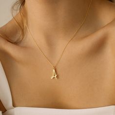 No need to spell it out — Wear your initial, your bestie’s, or your pet’s with this understated necklace. A playful take on a youthful Parisian inspired font, the Nella Letter Necklace is perfect for layering for a personalized, elevated look. Material: High Quality Solid 925 Sterling Silver Finish: Sterling Silver ∙ 18K Gold ∙ Rose Gold Featuring 8 - 10mm Initial Pendant SKU: MM-NM13F101 Pendant With Initials, A Letter Pendant Gold, Pendant Ideas Gold, A Letter Jewellery, A Initial Pendant, A Necklace Initial, A Pendant Letter, A Necklace Letter, A Letter Necklace