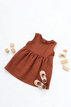 Girls linen round neck sleeveless dress in Burnt orange color. Summer boho children dresss for girls and toddlers. * Please note that actual colors may vary due to your computer resolution and monitor color restrictions. To have a perfect color match you can always order a linen samples. * Please, write up to 10 color fabric samples if you would like to get them with your purchase from my shop. Samples will be added for free  . Details: - 100% Lithuanian linen; - very soft, pure linen fabric, dr Brown Sleeveless Cotton Dress, Cute Orange Sleeveless Dress, Cute Brown Summer Dress, Cute Orange Sleeveless Sundress, Jewel Neck Dress, Kids Dress Patterns, Boho Kids, Burnt Orange Color, Square Neck Dress