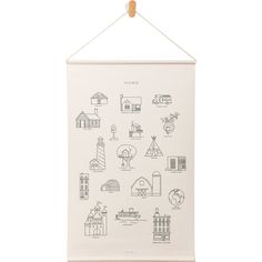 a white wall hanging with black drawings on it's front and back sides, along with the words home