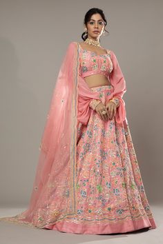 Candy floss pink raw silk lehenga with attached cancan, featuring hand embroidered floral puzzle patterns with cutdana and colorful sequins. Comes with embroidered padded blouse and dupatta.
Component: 3
Pattern: Hand Embroidered
Type Of Work: Floral Pattern, Sequins Cutdana
Neckline: Sweetheart
Sleeve Type: Puff Sleeve
Fabric: Raw Silk, Silk Organza
Color: Pink
Other Details: 
Floral patters
Embroidered cuffs
Back sheer panel
Approximate product weight: 4.5-5 Kg
Occasion: Bride, Wedding - Aza F Pink Raw Silk Set With Zari Work, Pink Raw Silk Saree With Dori Work, Pink Raw Silk Traditional Wear With Resham Embroidery, Pink Raw Silk Saree For Reception, Pink Traditional Wear With Resham Embroidery, Reception Pink Raw Silk Saree, Pink Art Silk Choli With Zari Work, Pink Dori Work Sets For Eid, Pink Chanderi Sharara For Reception