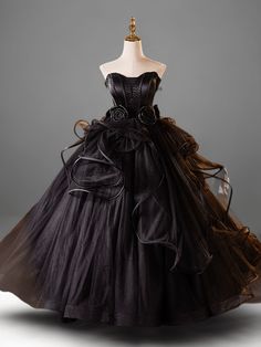 Gothic Black Tulle Ball Gown - Elegant Corset Back Wedding Dress with Floral Accents Plus Size Black Evening Dress For Costume Party During Prom Season, Black Floor-length Dress For Quinceanera, Elegant Black Dress For Quinceanera, Black Evening Dress With Boned Bodice For Prom, Elegant Black Ball Gown With Boned Bodice, Black Floor-length Corset Dress With Boned Bodice, Gothic Prom Dress With Boned Bodice, Fitted Black Ball Gown For Costume Party, Elegant Black Ball Gown For Costume Party