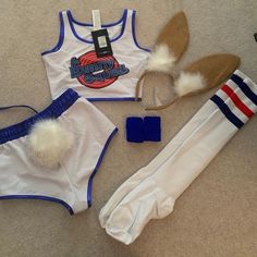 two white and blue sports bras, one with feathers on it