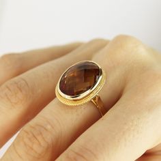 Color Changing Oval Zultanite Ring 14k Solid Gold Real Sultanite Ring Wedding Band Vintage Style Jewelry Christmas Gift For Women Anniversary ▶ 𝙋𝙍𝙊𝘿𝙐𝘾𝙏 𝙁𝙀𝘼𝙏𝙐𝙍𝙀𝙎 * 14k Solid Gold Ring * Zultanite Gemstone Ring Width: 1.50 cm ( 0.59 inches) * Zultanite Gemstone Ring Lenght: 2 cm ( 0.78 inches) * Zultanite Gemstone Ring Height: 8 mm ( 0.31 inches) - Our Zultanite ring is real and natural stone. You can tell from the color change that it is original. It is not lab made. Zultanite ston Oval Ring Vintage, Faceted Yellow Gold Topaz Ring For Wedding, Oval Faceted Rings In Fine Jewelry Style, Gold Faceted Gemstones For Wedding, Faceted Gold Gemstones For Wedding, Luxury Faceted Ring For Wedding, Oval Gold Topaz Ring With Diamond Cut, Luxury Faceted Wedding Ring, Luxury Oval Yellow Gold Gemstones For Anniversary