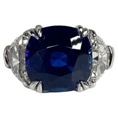 an oval blue sapphire and diamond ring