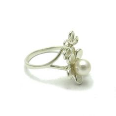 Sterling silver ring 925/1000, flower. Stamped 925.Approximate weight 3.6 grams. Top width 2.0cm (0.80inches). All our jewels are made from solid sterling silver 925/1000 and are carefully crafted by hand in our family workshop. We dispatch your orders in 5 working days, worldwide and the postage is $5. We ship registered priority mail. Please allow 5-7 working days for delivery in Europe and 10-15 working days outside Europe. For any questions - please do not hesitate to contact me! Silver Flower-shaped Ring For Formal Occasions, Formal Hallmarked Flower Ring, Sterling Silver Flower Ring For Wedding, Elegant Flower Shaped Ring Stamped 925, Elegant Flower Shaped 925 Stamped Ring, Formal White Sterling Silver Flower Ring, Hallmarked Sterling Silver Flower Ring, Hallmarked Sterling Silver Flower Ring For Anniversary, Hallmarked White Gold Flower Ring