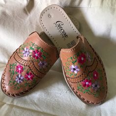 Detailed Brown Embroidered Sandals. Closed Front And Open Back. Size On Shoes Says 4 But It Will Fit Anyone Size 5 Through 6.5 (In Us Sizes). Originally Bought At $40 And Never Worn. Spring Bohemian Clogs With Round Toe, Traditional Open Toe Spring Clogs, Traditional Open Toe Clogs For Spring, Traditional Pink Sandals With Round Toe, Traditional Leather Mules For Spring, Traditional Flat Heel Spring Mules, Pink Bohemian Slip-on Sandals, Traditional Open Toe Mules For Spring, Traditional Flat Heel Mules For Spring