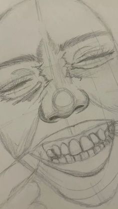 a drawing of a clown's face with his mouth open