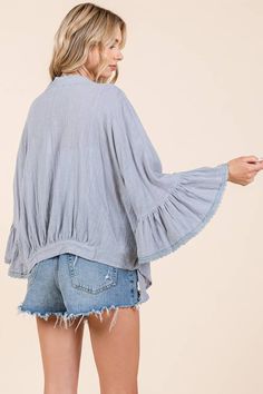 This light denim open front cardigan exudes elegance with its shawl collar and delicate lace trim. The ruffle trim sleeves and light blue color add to its unique charm. 100% Cotton Spring Cotton Outerwear With Lace Trim, Long Sleeve Cardigan With Lace Trim For Spring, Chic Lace Trim Cardigan For Spring, Light Blue Cotton Summer Outerwear, Light Blue V-neck Cardigan For Spring, Light Blue V-neck Outerwear For Spring, Blue Open Front Top For Spring, Athleisure Shoes, Denim Leggings