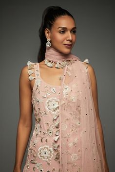 Rose pink short kurta with floral blossom embroidery. Paired with a sharara with mirror buttis and dupatta with tassel work. - Aza Fashions Designer Sleeveless Pink Anarkali Set, Pink Sharara With Resham Embroidery, Sleeveless Pink Palazzo Set For Party, Pink Sleeveless Palazzo Set For Party, Pink Sleeveless Anarkali Set For Festive Occasions, Pink Sleeveless Anarkali Set For Festive Season, Pink Sleeveless Lehenga For Eid, Pink Sleeveless Sets With Mirror Work, Fitted Sleeveless Pink Palazzo Set