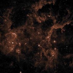 an orange and black space filled with stars