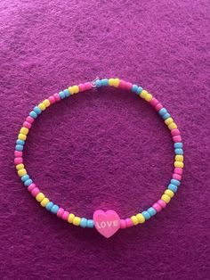 Pink,Yellow and Blue seed bead bracelet. 7 inches Fun Yellow Beaded Bracelets, Playful Yellow Beaded Bracelets, Yellow And Pink Bracelet, Pink Purple Blue Beaded Bracelet, Blue And Yellow Bracelet, Seed Bead Bracelet, Yellow And Blue, Seed Bead Bracelets, Blue Bracelet