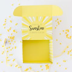 an open yellow box with the words sunshine on it