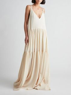 The Elegant Resort Deep V-Neckline Strappy Maxi Dress exudes sophistication and style. Designed with a deep V-neckline and strappy details, this dress is perfect for resort wear or special occasions. Its flowing silhouette and subtle beige color enhance its elegant appeal. Details: Material: PolyesterFit Type: Loose FitThickness:RegularStyle:Casual,Vacation @Note:Size: please check measurements carefullyPlease allow 0.5-1" difference due to manual measurementDifferent monitor settings means colo Beach Party Dress, Strappy Maxi Dress, Long Beach Dress, Elegant Maxi Dress, Suspender Dress, Side Splits, Easy Breezy, Moda Fitness, White Maxi Dresses