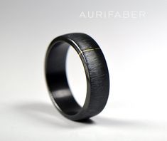 Simple black zirconium ring with gold stripe. You can choose between yellow gold, red rosé gold or white gold detail to decorate this black zirconium ring. Narrow polished gold stripe brings contrast to scratched black zirconium. Gold stripe goes through the ring, so you can see it from inside also. Comfort fit inside with satin matte finish ensures comfortable wearing. This black zirconium ring is handmade by goldsmiths of Aurifaber from solid zirconium and is perfected with minimalistic gold d Zirconium Ring, Black Zirconium Ring, Rosé Gold, Old Rings, Matte Texture, Rose Rouge, Gold Stripes, White Rose Gold, Gold Details