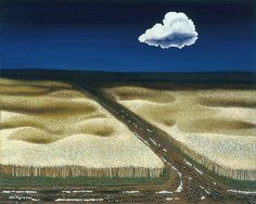 an aerial view of a road in the middle of a wheat field under a cloudy sky