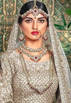 (Nickel Free Costume jewelry) A beautiful traditional Bridal Set with necklace which can be adjusted at the back and style drop earrings, all made with high quality Swarovski Crystals and have lifetime guarantee on them. Comes as; Can be bought together, mix and match or separates. (More accessories can be made too) 1.Choker Necklace 2.Drop Earrings 3.head piece  tika. Made of Swarovski Crystals and Tin Alloy metal.  - Can be bought as a set or separates. -Handcrafted Jewelry in London -Earrings for Pierced earrings, can be made as Clip On if needed, -Nickel Free Jewelry for sensitive ears -Perfect For Weddings, Bridal Wear,separates for Parties. -Life Time Guarantee on Crystals. Colour Combo- Plating: Antique Gold. Accent stone: cream pearl,RED Secondary Stone: Crystal Golden Shadow, Crea Elegant Bridal Sets With Tilla For Traditional Ceremonies, Elegant Kundan Bridal Sets For Traditional Ceremonies, Elegant Red Meenakari Dupatta, Elegant Bridal Sets With Zari Work For Ceremonial Occasion, Elegant Bridal Sets With Zari Work For Ceremonial, Elegant Bridal Sets For Traditional Ceremonies, Elegant Red Sets With Intricate Design, Elegant Meenakari Bridal Necklace For Traditional Ceremonies, Heavy Elegant Gold Dupatta