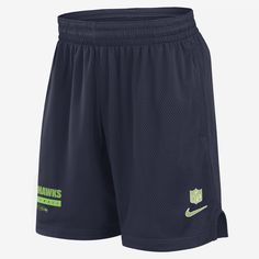 Featuring Seattle Seahawks details at the hem, these Sideline Shorts are designed with sweat-wicking technology and mesh fabric for a dry, breathable wear. The adjustable waistband helps create a flexible fit. Nike Moisture-wicking Bottoms For Sports Events, Nike Moisture-wicking Bottoms For Sports, Navy Nike Activewear For The Gym, Navy Nike Sporty Athletic Shorts, Nike Navy Sporty Athletic Shorts, Nike Sporty Navy Athletic Shorts, Navy Moisture-wicking Functional Bottoms, Functional Navy Moisture-wicking Bottoms, Navy Functional Moisture-wicking Bottoms