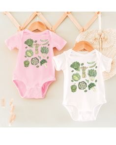 An adorable greens bodysuit for baby!  What a way to start teaching about veggies!  Perfect for year round with layering during cooler months.     * Q U I C K * F A C T S * ✺ 100% ringspun cotton ✺ Light fabric ✺ plastic snaps closure  ✺ Inside out and wash and dry normally (on cool for best results). Do not iron decoration. ✺ printed using DTG Direct to Garment printing.  ✺ Colors may vary due to computer monitors and printing inks. ✺ While we offer several shirt colors some may have a better contrast with the design. Keep that in mind when choosing your color.  * S I Z I N G * ✺ Sizing is unisex  ✺ Size guide and fit: Please see size charts in photos for guidance on sizing to ensure the best fit.  ✺ The best way to find your size is to measure a shirt you own that fits you well and compa Green Short Sleeve Cotton Onesie, Green Cotton Shortsleeved Onesie, Green Cotton Short Sleeve Onesie, Green Cotton Short-sleeve Onesie, Green Playful Short Sleeve Bodysuit, Playful Green Short Sleeve Bodysuit, Cute Fitted Green Onesie, Ocean First Birthday, Baby Clothes Gender Neutral