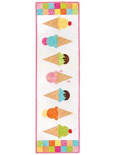 an ice cream themed wall hanging on a white wall