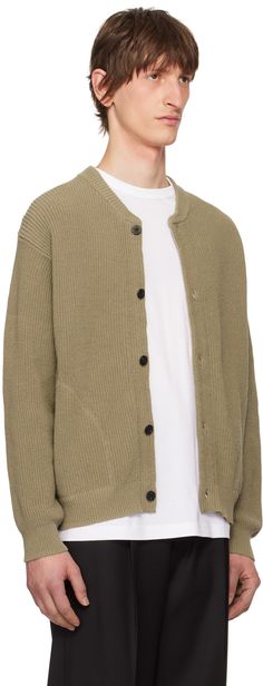 Rib knit cotton cardigan. · Crewneck · Button closure · Seam pockets · Horn hardware Supplier color: Khaki Cotton Button-up Cardigan With Ribbed Cuffs, Oversized Cotton Sweater With Button Closure, Knit Outerwear With Ribbed Cuffs And Button-up Style, Knit Button-up Outerwear With Ribbed Cuffs, Knit Outerwear With Ribbed Cuffs, Fall Cotton Cardigan With Buttoned Pockets, Cotton Cardigan With Buttoned Pockets For Work, Cotton Sweater With Button Cuffs For Work, Cotton Sweater With Buttons For Work