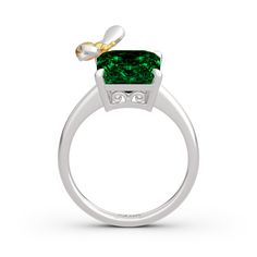 Make the moment you ask her to marry memorable with this sparkling vintage-inspired ring. Crafted in sterling silver, it features a shimmering emerald cut center stone while a lifelike bee is set on the edge of the stone to increase more mystery. So elegant it needs no further accompaniment, this ring is finished with a bright polished shine.Weight: 4.76 gWidth: 14.4 mmHeight: 9.6 mmThickness: 2.8 mmMaterial: 925 SilverPlating Color: Silver, Yellow Gold Sterling Silver Emerald Ring Asscher Cut, Asscher Cut Emerald Ring In White Gold As Gift, White Gold Emerald Ring With Asscher Cut For Gift, Asscher Cut Emerald Ring In Sterling Silver For Anniversary, Asscher Cut Emerald Ring For Gift, Formal Asscher Cut Emerald Ring In Sterling Silver, Asscher Cut Emerald Ring In White Gold, Sterling Silver Asscher Cut Emerald Promise Ring, Sterling Silver Radiant Cut Emerald Ring For Anniversary