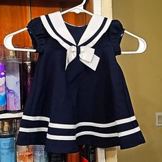 Nwt Baby Girl Sailor Dress Size 6-9 Month. This Dress Still Has The Plastic Tag Still Attached. The Actual Information/ Price Tag Has Fallen Off. Never Been Worn. This Dress Is Absolutely Adorable. Cute Navy Dress For Dress-up Occasions, Cute Navy Short Sleeve Dress, Navy Fitted Cute Dress, Cute Fitted Navy Dress, Cute Navy School Dress, Navy Cotton Playtime Dress, Navy Cotton Dress For Playtime, Girls Sailor Dress