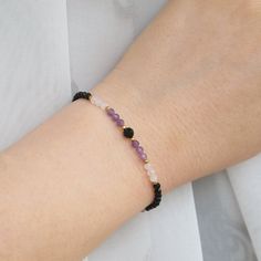 Dainty Empath protection bracelet. Black tourmaline, amethyst and rose quartz bracelet. 100% handmade ..:: Materials ::.. Gemstone beads - 4mm + 3mm Gold plated stainless steel beads - 2mm Stretchy cord ..:: Closure ::.. Bracelet is made using stretchy cord, so it is very easy to put on, no clasp at all ..:: Sizes ::.. Bracelet comes in various sizes, so please measure your wrist carefully before shipping. If you are in between sizes, I'd suggest to opt for larger size ..:: Packaging ::.. Bracel Black Amethyst Beaded Bracelets, Black Amethyst Gemstone Beaded Bracelets, Black Amethyst Gemstone Bracelets, Black Amethyst Gemstone Bracelet, Black Amethyst Bracelet As Gift, Adjustable Black Amethyst Beaded Bracelets, Black Amethyst Crystal Bracelet In Spiritual Style, Empath Bracelet, Amethyst And Rose Quartz