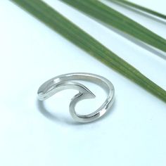 Silver Wave ring . Handmade sterling silver wave Surf ring. This is the perfect ring for surf lovers. Hand shaped from 1.5mm square Sterling silver wire each ring is as unique as each wave that breaks. Please allow up to 10 days for commission pieces, although if you need it quickly please contact me as this can be arranged.  All jewellery comes in Sea Surf Rocks branded recycled kraft packaging and is sent with a first class 'signed for' service. Wave Surf, Kraft Packaging, Sea Glass Ring, Wave Ring, Surfing Waves, Hand Shapes, Glass Rings, Gifts For My Sister, Perfect Ring