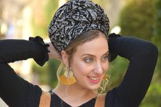 "How To Tie https://youtu.be/e_O07wUOu6M This lovely, soft, handcrafted headscarf is an alluring combination of faux velvet burnout adds a unique touch to this light weight scarf. It's simple color tones allow it to be ultimately versatile. . It can be tied in multiple ways. This \"Mitpachat \" is a Scarf Tichel, whose shape is a large rectangle and can be worn to conceal all of one's hair or to show some hair. It is fashionable for all Seasons and comfortable enough to wear all day. The fabrics Black Bohemian Headwrap Headband, Black Bohemian Headwrap In Headband Style, Black Bohemian Headband One Size, Bohemian Black Turban One Size Fits Most, Adjustable Black Bohemian Headscarf, Black Bohemian Headscarf For Festival, Adjustable Black Headwrap, Jewish Headcovering, Scarf Head Covering