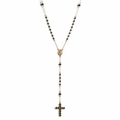 Born from the ever-present rosary prayer beads found in holy places and markets around the city of San Miguel de Allende, the Saint Mia Rosary Style Necklace is adorned with a beaded cross that hangs from an 8-inch drop. Fully adjustable, this necklace is wholly contemporary yet steeped in Mexican history. The cross, which is double-sided, is made with vintage beads in an open setting. Inspired by a Patron Saint with a heart of gold, this piece is made to be original, as it's available in a vari Spiritual Beaded Cross Pendant Necklace, Spiritual Necklace With Miraculous Medal And Round Beads, Spiritual Crucifix Cross Necklace For Jewelry Making, Spiritual Crucifix Jewelry With 8mm Beads, Beaded Spiritual Cross Pendant Necklace, Spiritual Beaded Cross Pendant Jewelry, Spiritual Cross Necklace With Polished Beads, Adjustable Cross Necklace With Black Beads, Adjustable Black Beads Cross Necklace