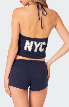 Rock a sporty, sunshine-ready look in this stretchy cotton halter top cut to an abbreviated length. Ties at neck Halter neck 95% cotton, 5% spandex Machine wash, dry flat Imported Casual Fitted Halter Top With T-back, Fitted T-back Halter Top Athleisure, Summer T-back Halter Top For Gym, Stretch Summer Sportswear Tops, Fitted T-back Tops For Spring, Casual Fitted T-back Crop Top, Sporty Cotton Tank Top For Spring, Summer Gym T-back Tops, Summer Stretch Crop Top With Letter Print