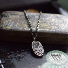 Oxidised Silver Rustic Skull and Flowers Pendant Necklace. Necklace is made of oxidised (blackened and polished) sterling silver (925). The process of oxidizing sterling silver jewellery involves treating the silver with a sulphur solution that speeds up the natural tarnishing progress. This gives the piece a vintage, rustic, and slightly gothic appearance, enhancing the contrast and texture of the details. The length of the chain is customizable and ranges from 40 to 70 cm. Ideal for layering w Skull And Flowers, Sterling Silver Jewellery, Flower Pendant Necklace, Necklace Necklace, Oxidized Silver, Oxidized Sterling Silver, Flower Pendant, Silver Jewellery, Silver 925