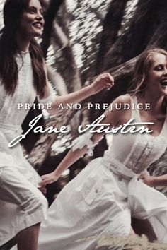 two women in white dresses are running through the woods with their arms around each other