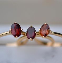 Simple Garnet Ring / Garnet Ring / Silver Garnet Ring / 14k Solid Gold Garnet Ring / Victorian Garnet Ring / Gift For Her / Birthday Gift ☆ Details ☆ * Made of 925 Sterling Silver * Available in 14k Gold Plating, Rose Gold Plating or Rhodium Plated * We use a THICK, DURABLE 14k GOLD plating - for a piece that will last you years to come!  * VERY HIGH QUALITY Main Stone - Natural Garnet Shape - Oval Metal - Select From Options NOTE - Inbox me for the bigger size if it is not available in the size option.            - If You Want we can send you the picture before Dispatch Msg Me For More Info.              - Feel free to contact us, If you have any queries we will happy to help you. ------------------------------------------------------------------------------------------------------------- Gold Garnet Cluster Promise Ring, Gold Garnet Cluster Ring As Gift, Oval Garnet Ring In Yellow Gold, Fine Jewelry Yellow Gold Garnet Ring, Garnet Cluster Ring As A Gift, Gold Faceted Ruby Ring For Anniversary, Yellow Gold Garnet Cluster Ring As Gift, Yellow Gold Garnet Ring Fine Jewelry, Gold Oval Garnet Birthstone Ring