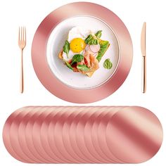 a plate with an egg, bacon and spinach on it next to pink plates