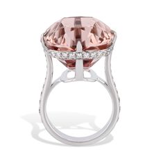 Marvel at the breathtaking beauty of this stunning 18kt. white gold Cushion Cut Morganite Diamond White Gold Ring! As a centerpiece, it holds a 39.18ct cushion cut Morganite, gracefully accompanied by diamond pave. A must-have size 8.25 handmade by H&H Designs. Cushion Cut Morganite Diamond White Gold Ring 18kt. White gold 39.18ct Cushion Cut Morganite in the center GIA # 6237018767 1.00ct F/G VS1 Diamond Pave Size 8.25 H Designs SKU: 23087 Luxury Cushion Cut Diamond Ring For Formal Occasions, Luxury Cushion Cut Diamond Ring For Formal Events, Elegant Cushion Cut Diamond Ring With Single Cut Diamonds, Platinum Diamond Ring With Cushion Cut For Formal Events, Platinum Rings With Pave Setting And Cushion Cut, Platinum Cushion Cut Rings With Pave Setting, Cushion Cut Platinum Diamond Ring For Formal Occasions, Platinum Cushion Cut Diamond Ring For Formal Events, Formal Platinum Diamond Ring With Cushion Cut